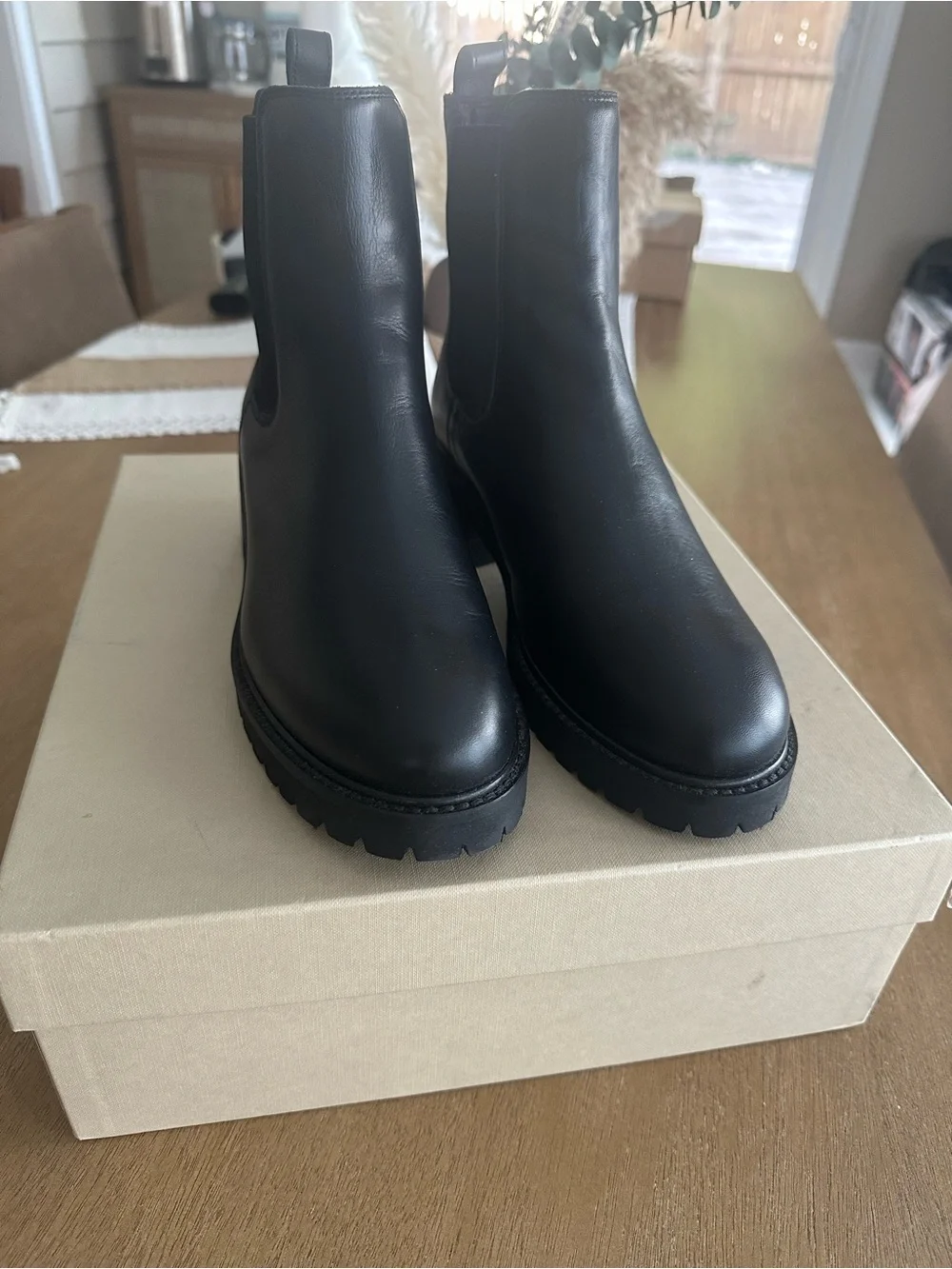 La CANADIENNE Black Leather Chelsea Lug Booties